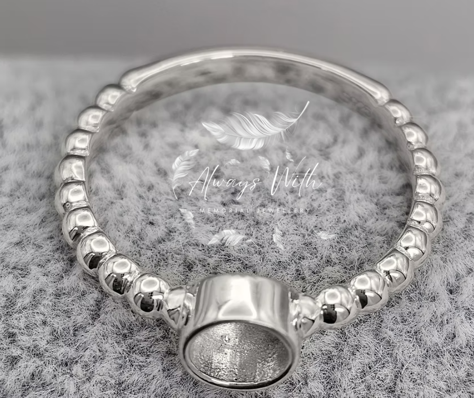 The “Dora" Ring